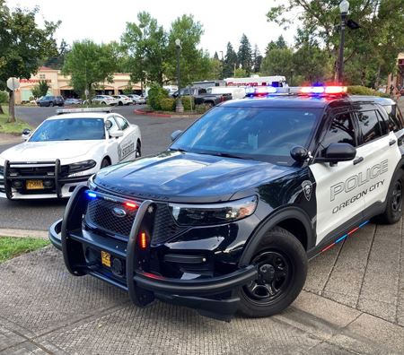 Oregon City Police cruiser in front of Fred Meyer for retail theft sting